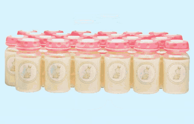 a row of baby bottles with a label that says ' peter rabbit '