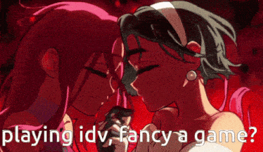 a picture of two girls kissing with the words playing idv fancy a game below them