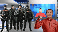 a man in a red jacket stands in front of a group of soldiers wearing helmets
