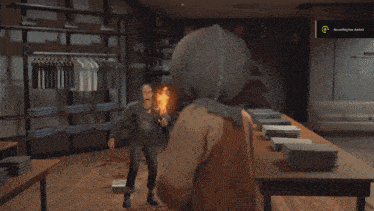 a scarecrow is being kicked by a person in a room
