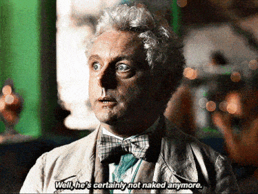 a man wearing a bow tie and a jacket says well he 's certainly not naked anymore