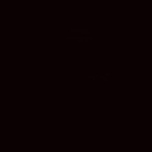 a red circle with a white circle in the middle of it