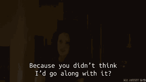 a man is looking at a computer screen in the dark and saying `` it was n't me '' .