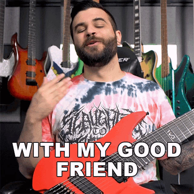 a man playing a red guitar with the words " with my good friend " above him