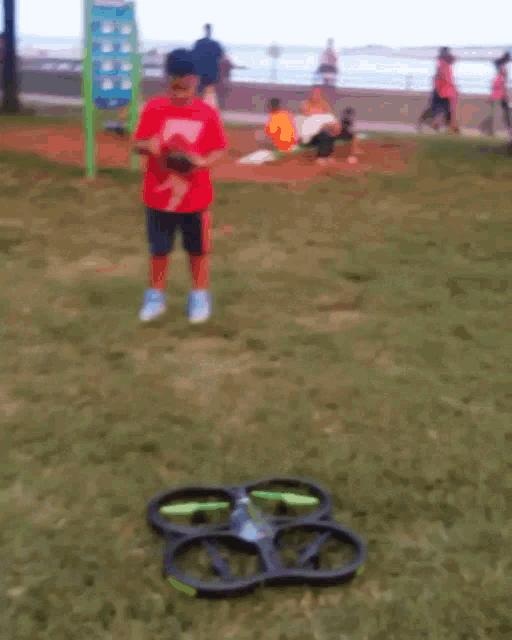 a blurry picture of a man in a red shirt