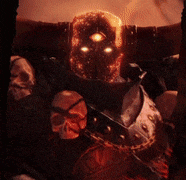 a person with a skull on their shoulder and a glowing mask on their head