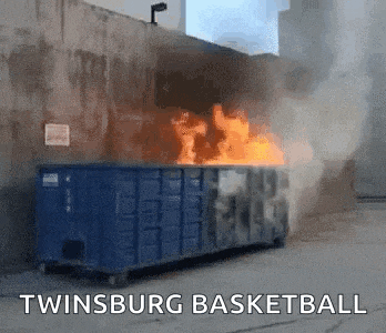 a dumpster is on fire with the words twinsburg basketball written above it