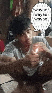 a man is lighting a cigarette with a speech bubble that says wayae wayae wayae