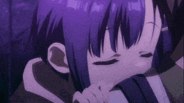 a close up of a girl with purple hair