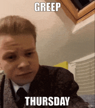 a man in a suit and tie is making a funny face and the caption says greep thursday