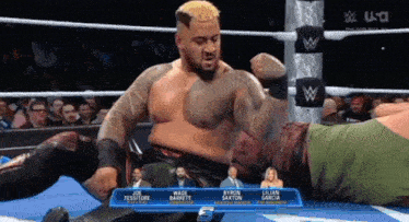 a wrestling match between byron saxton and wade barrett is being shown on usa