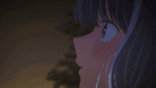 a boy and a girl are looking at each other