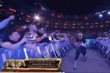 an advertisement for the intercontinental championship shows a wrestler entering the ring