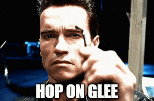 arnold schwarzenegger is pointing his finger at the camera with the caption hop on glee