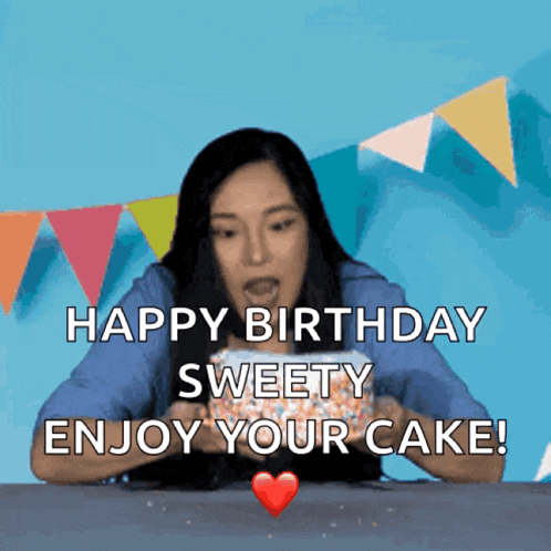 a woman is holding a birthday cake with the words happy birthday sweety enjoy your cake