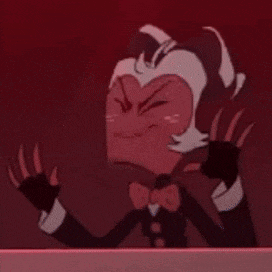 a cartoon character in a suit and bow tie is standing in a box with his arms outstretched .