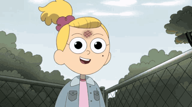 a cartoon girl with a red spot on her forehead is smiling