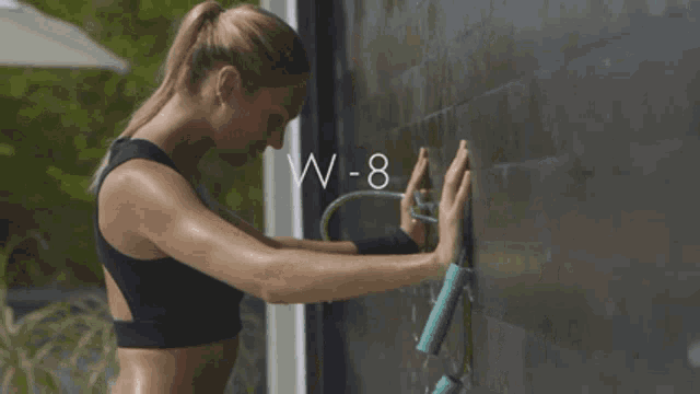 w-6 when they feel like giving up is written above a woman in a black top