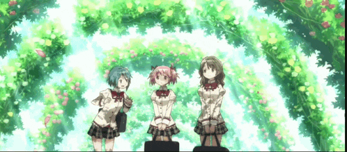 three anime girls standing in front of a tree