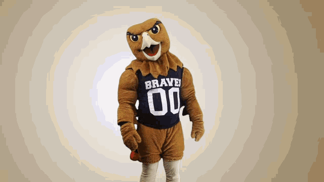 a mascot is wearing a jersey that says brave on it