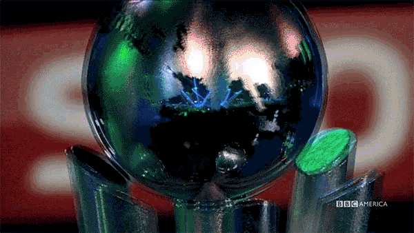 a bbc america advertisement shows a globe surrounded by metal cylinders
