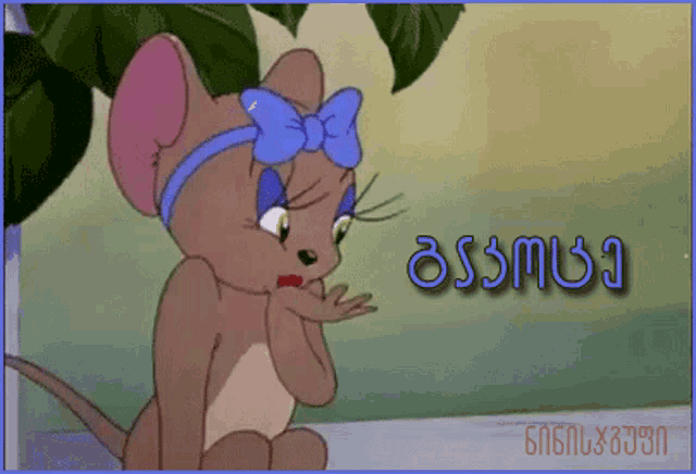 jerry from tom and jerry is wearing a blue bow headband