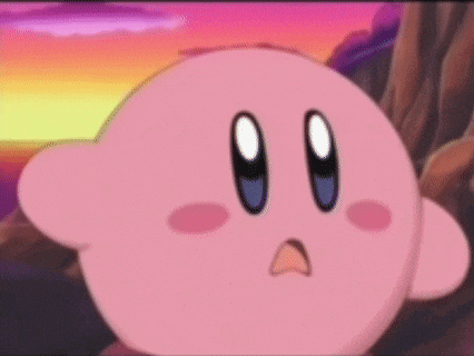 a close up of a pink cartoon character with a surprised face .