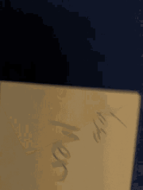 a close up of a piece of paper that says sorry