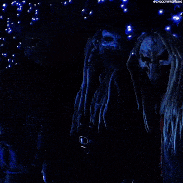 a man with dreadlocks and a skeleton face painted on his face