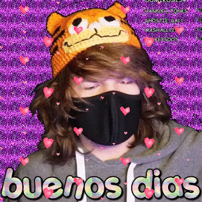a man wearing a mask and a tiger hat says buenos dias on a purple background