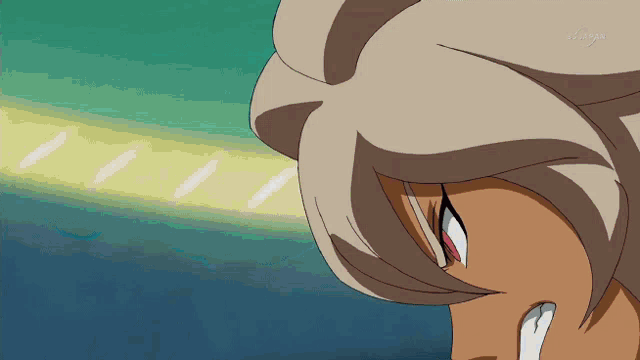 a close up of a person 's face with the letters tbs on the bottom right
