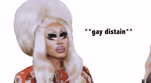 a drag queen says " gay distain " in front of her