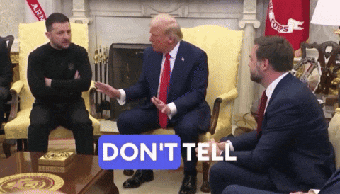 a group of men are sitting around a table with a sign that says " don 't tell "