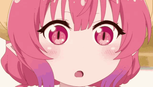 a close up of a girl with pink hair