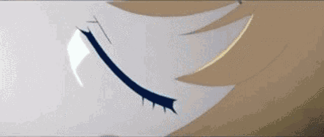 a close up of a person 's face with their eyes closed
