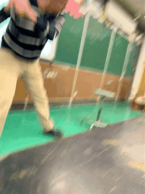 a blurry picture of a person standing in a room