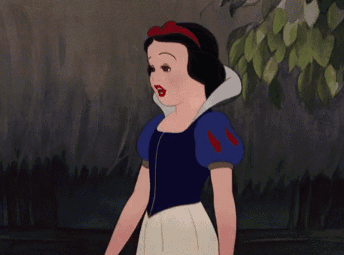 snow white from disney 's snow white and the seven dwarfs is wearing a blue and white dress