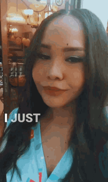 a close up of a woman 's face with the words i just above her
