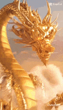 a statue of a golden dragon is flying in the sky .