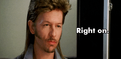 a man with a mullet and a beard is standing in front of a sign that says right on