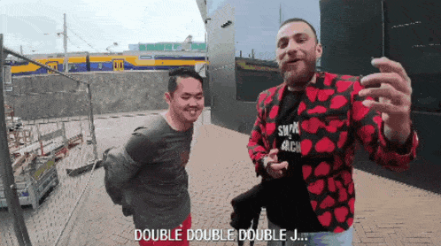 a man taking a picture of himself with the words double double double j