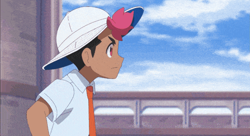 a boy wearing a white hat with a pink flower on the brim