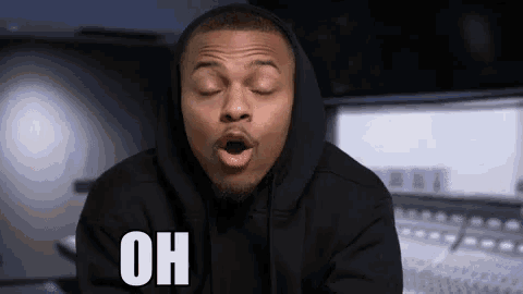 a man in a black hoodie is making a funny face with his mouth open and the word oh above him