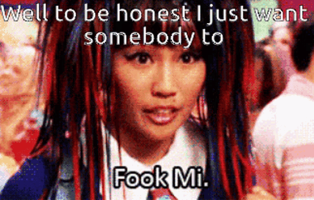 a woman with red and blue dreadlocks says well to be honest i just want somebody to fook mi.