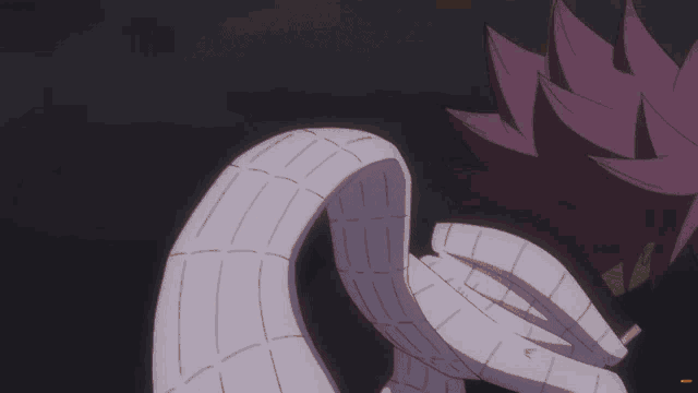 a close up of a cartoon character 's tail with a dark background .