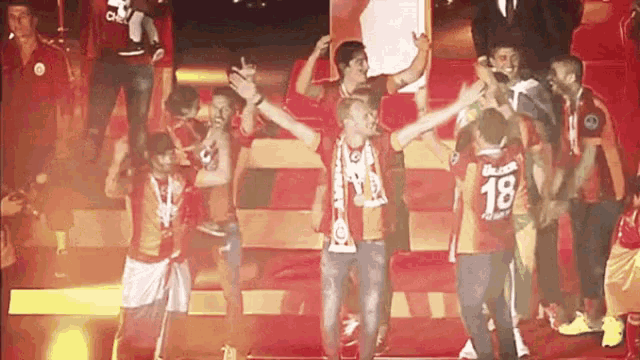 a group of soccer players including number 18