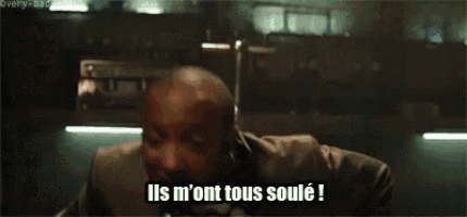 a man in a suit is dancing in a bar and says ils m 'ont tous soule