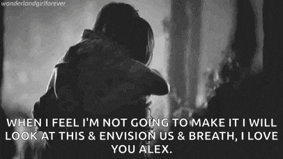 a man is hugging a woman in a black and white photo with a quote .