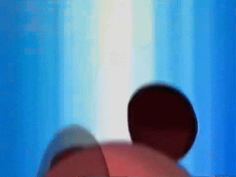 a close up of a mickey mouse 's head with a blue background