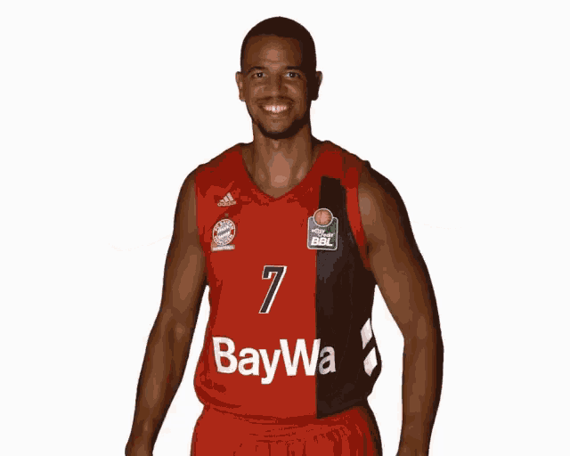 a basketball player wearing a red and black jersey with the number 7 on it